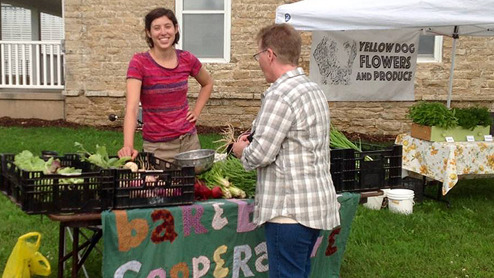 This is a picture of a Silverwood Park Grower Partner selling produce.