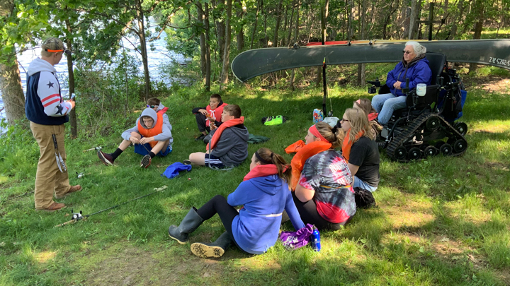 This is a picture of Edgerton summer school students at a fishing outing at Rice Lake.