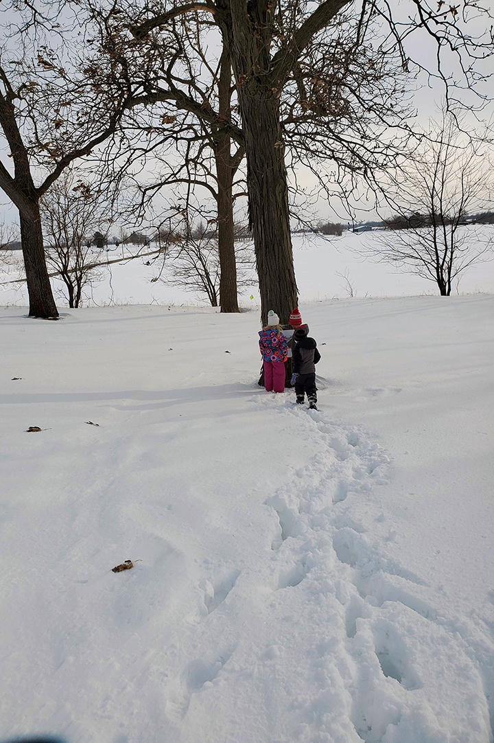 Rita Fox's grandchildren on "Under in the Mud" story walk